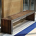 Flat slat timber bench at Melrose Arch