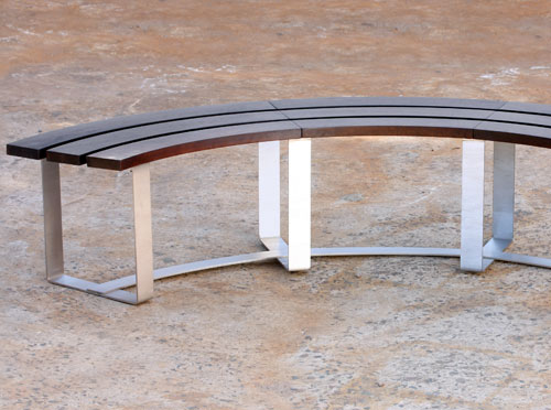 Curved timber and stainless steel bench